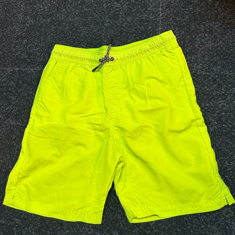 Neon yellow little boys swimming trunks